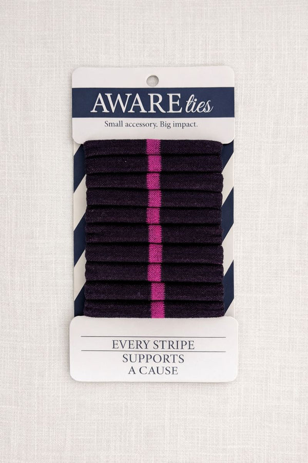 Pack of striped ties with a visible brand label on a textured background