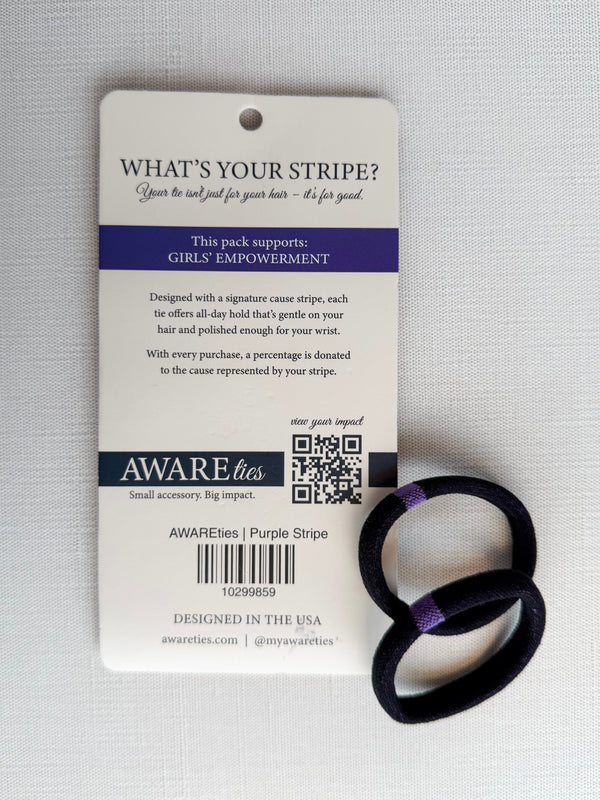Purple hair tie with 'Awareties' packaging on a gray background